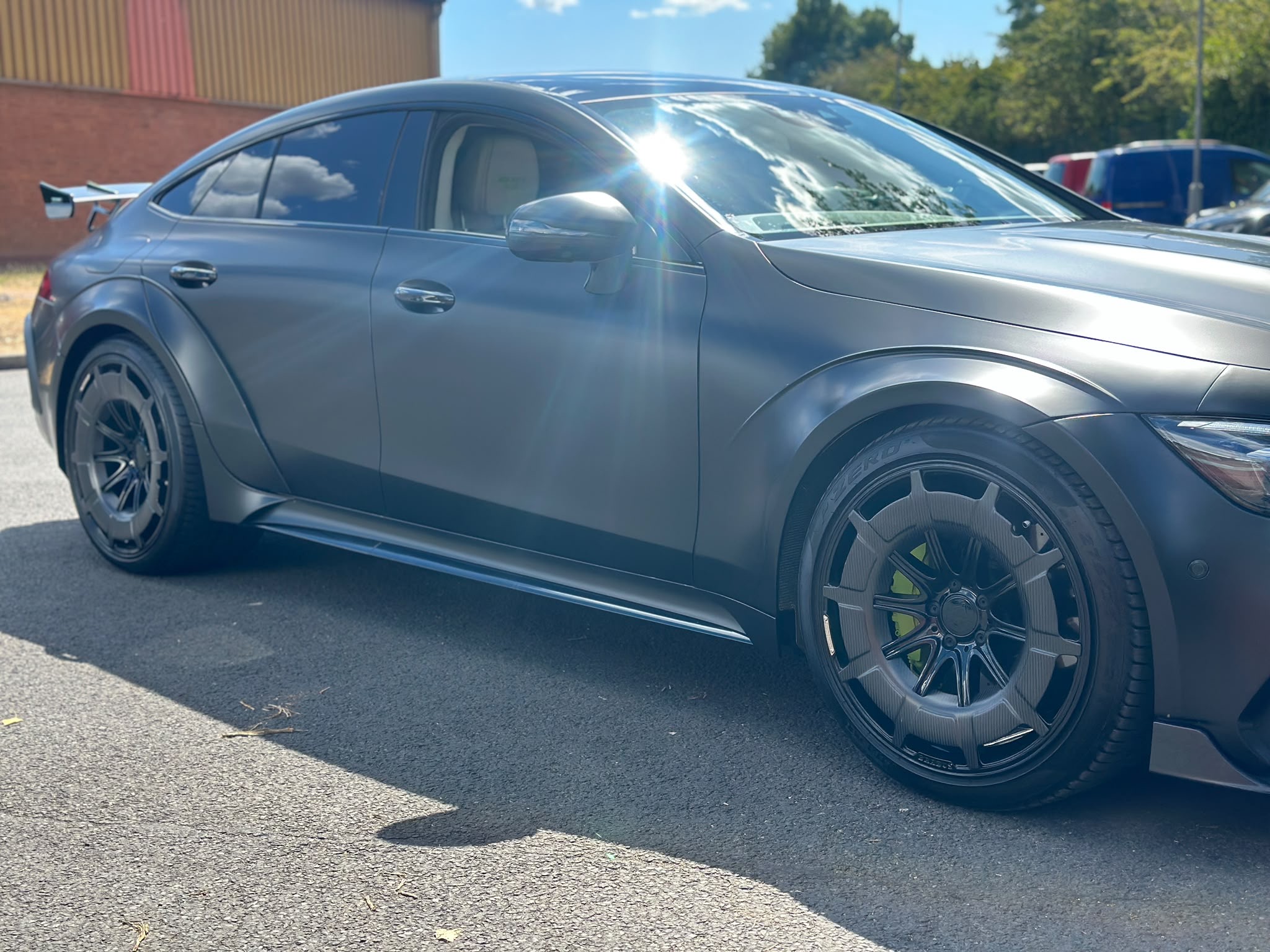 Matte black AMG GT side profile